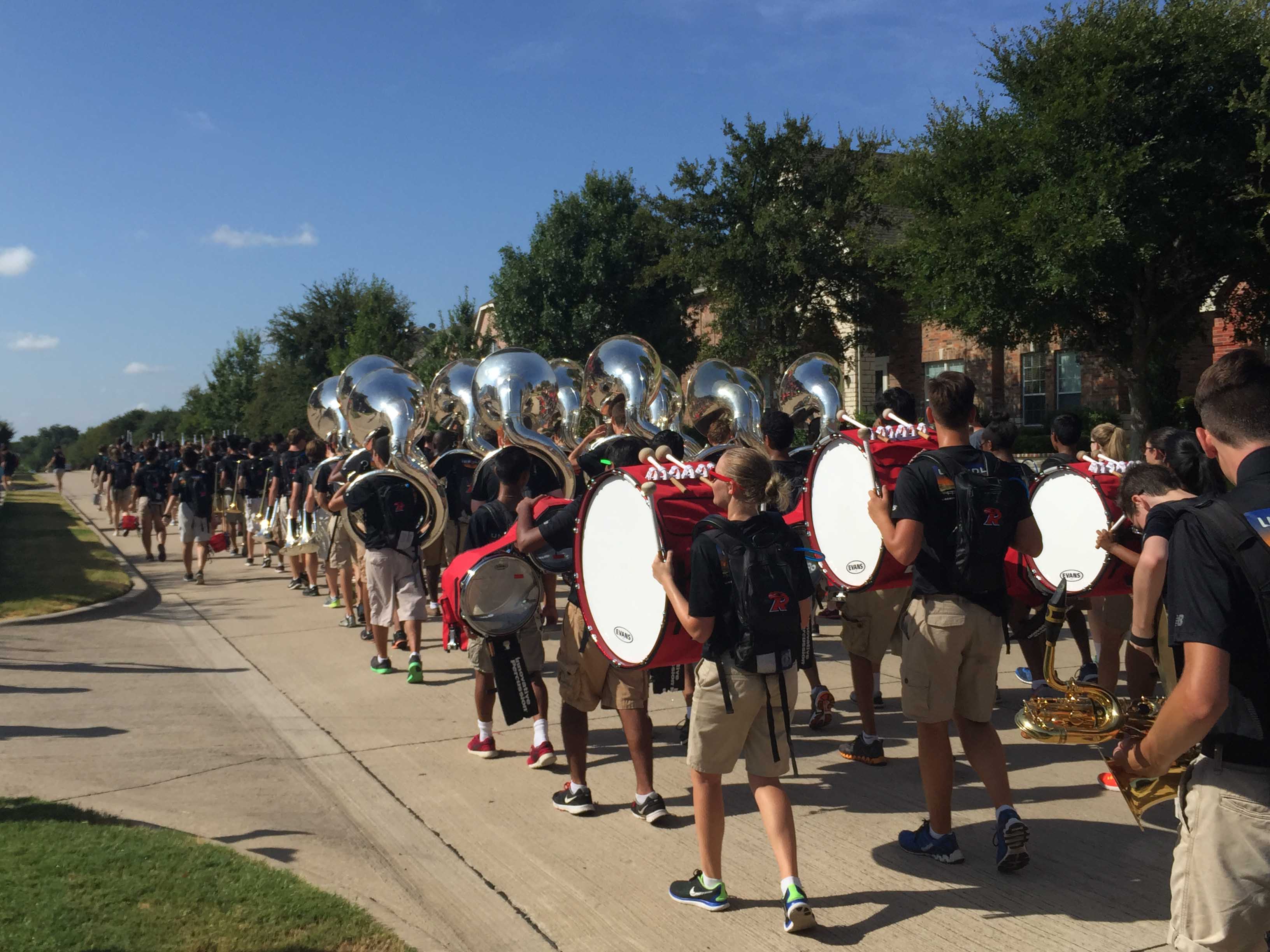 The band marched through the neighborhoods and played show music and mini concerts hoping to raise money for the year. 