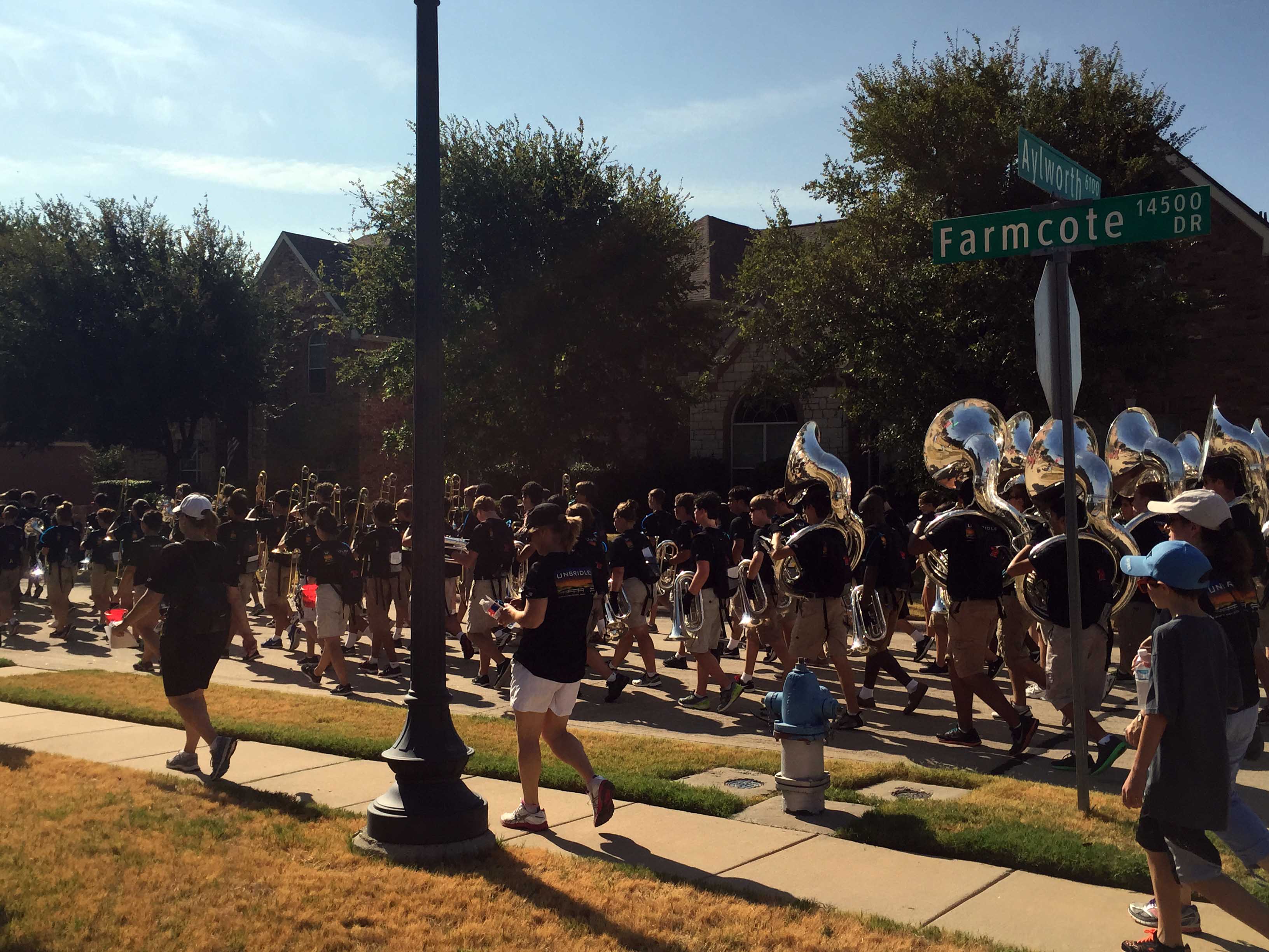 As part of its annual March-a-thon fundraiser, the band spent Saturday morning marching through local neighborhoods including a stroll down Farmcote Drive.
