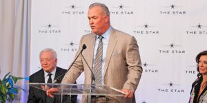 With Cowboys owner Jerry Jones to his left and Charlotte Jones Anderson to his right, Chief Operating Officer and Executive Vice President of the Dallas Cowboys, Stephen Jones addresses talks to the audience about The Star. 