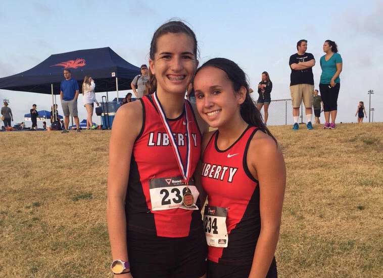 The girls cross country team finished in sixth place at the FISD Invitational Meet at Warren Park, Saturday August 22. Sophomore Carrie Fish (left) finished first.