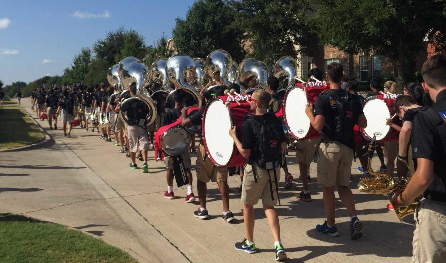 From marching in the streets as part of a fundraiser to performing at halftime of football games, the band has a full schedule in the fall. Helping to lead the band are the drum majors who act as a intermediary between the band and the band directors.