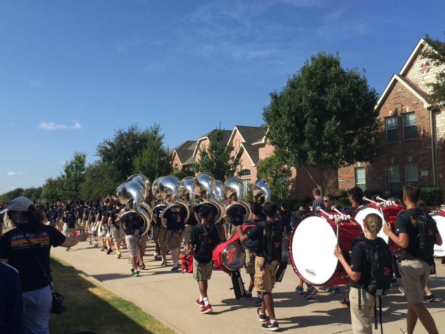 After playing at performing at Fridays football game in McKinney, the band took to local neighborhoods less than 12 hours later for its annual March-a-thon.