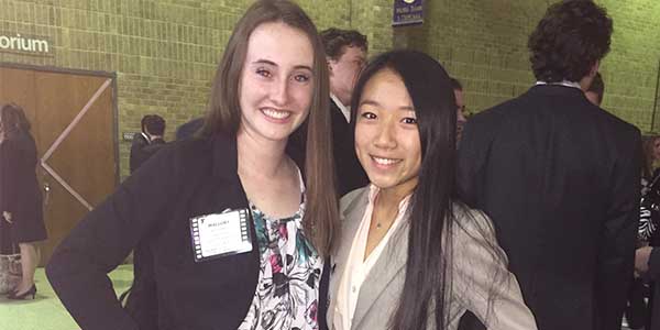 Competing in the Model UN competition over Thanksgiving break, juniors Mallory Reed (left) and Amy Zhang (right) pose for a picture in the lobby. Three students won the Distinguished Delegates Award and one student won the Secretary General Award, the highest honor, at the Model UN meet.
