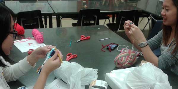 Students in NAHS start the process of crocheting beanies that will eventually be donated to cancer patients. 