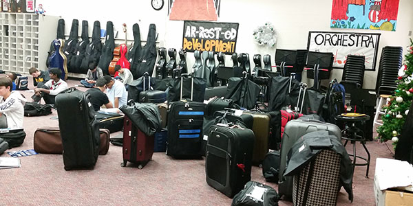 The orchestra room is filled with dozens of suitcases as the group leaves for Chicago Monday afternoon for its performance at the Midwest Clinic. 