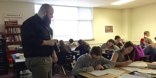Watching students as they work, AP English teacher Travis McNair has been acknowledged for his exceptional teaching skills and impactful connections with students with his nomination for the LifeChanger of the Year Award, an annual award that recognizes K-12 teachers regardless of their origin or beliefs. 
