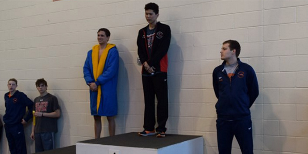 Standing atop the podium after placing first in the 100 breaststroke at the regional meet, Jiwoo Oh is competing in multiple events at the UIL State Meet Friday and Saturday in Austin. 
