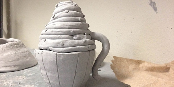 Ceramics students create original teapots as part of a project for the class. 