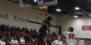 Throwing down a dunk against Centennial, sophomore Reggie Chaney is ranked number one by 2018 Texas Prospect Rankings. 