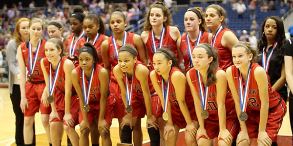 After receiving their medals for finishing 2nd in the girls 5A championship, the team poses for a picture. 