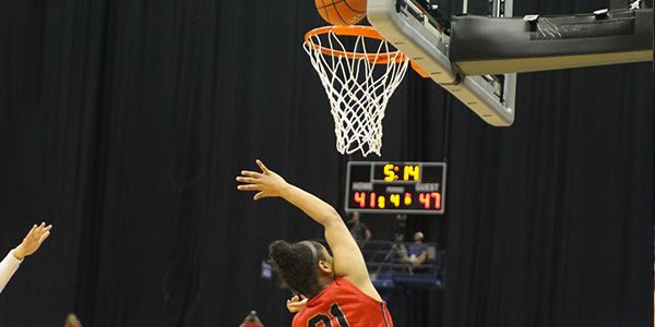 Rebecca Lescay attempts a lay up during the state semi final against Vista Ridge. 