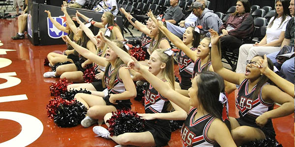 Cheerleaders cheer during Thursdays win in the state semi finals against Vista Ridge. 