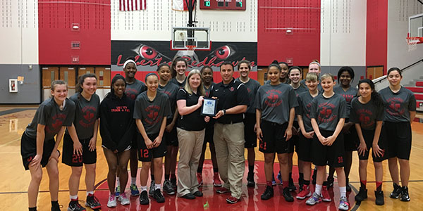 Girls’ basketball team athletic trainers Kendi Kimball and Joseph White were presented with the Ben Hogan Sports Medicine award honored by UIL recognizing their work in training on Monday.
