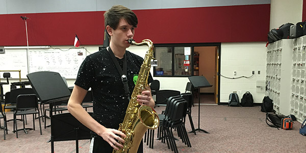 Playing the baritone saxophone, junior Zach Gross spent his spring break playing with the Jazz Band of America. 
