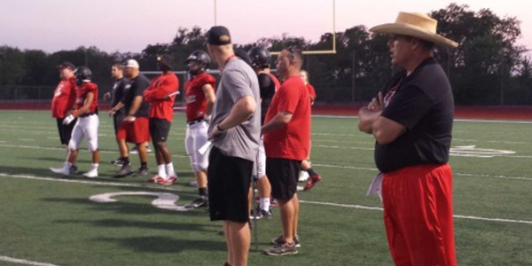 Thursdays intrasquad scrimmage brought spring practice to an end. In the above photo from August, head coach Chris Burtch watches over the team Aug. 7, 2015.