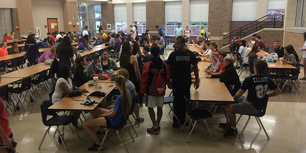 Before heading out to Six Flags on Wednesday, seniors met in the cafeteria before boarding school buses. 