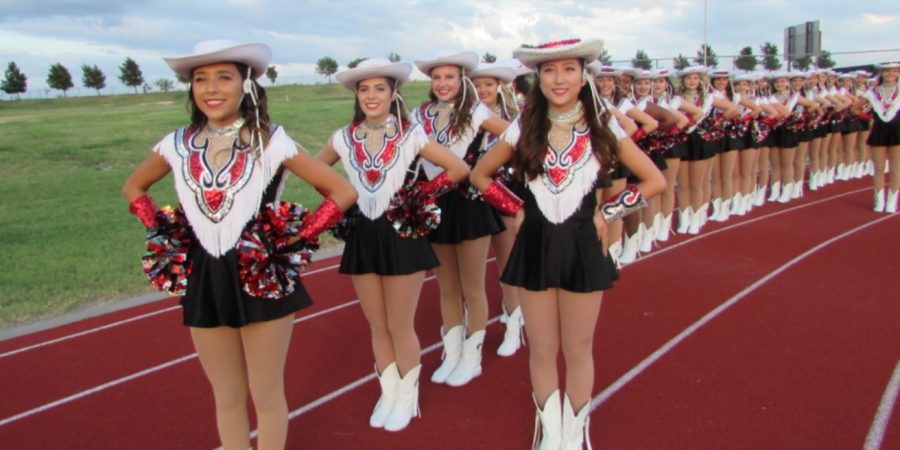 Starting practice long before the first day of school, the Red Rhythm dance team shown lining up at Redhawk Rally on Aug. 13, hopes all the summer work pays off. 
“At the end of the day it’s just [about] knowing that they’re getting along and working together,” director Nicole Nothe said. 
