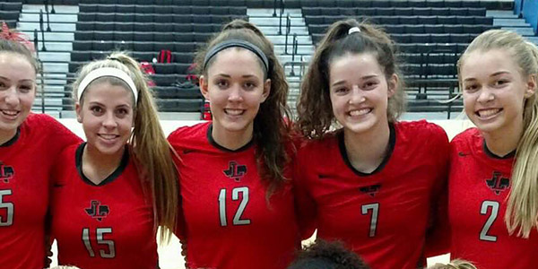 Camille Thompson (center) with teammates Olivia Overlin (far left), Katelyn Burtch (right) and Jenna Weenas (far right) is a middle blocker whos been playing volleyball for nine plus years.