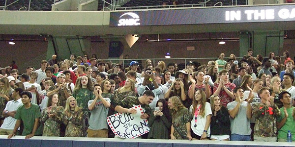 The student section decked out in camouflage for the game. 
