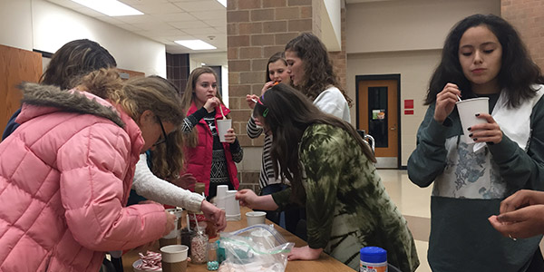 Hot chocolate, cookies, chips and other snacks were some of the treats available for Best Buddies club members at the organizations winter party Thursday after school in the cafeteria. 