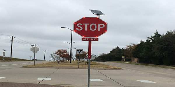 There have been 452 traffic stops stops in front of the school since it opened but hopefully the flashing stop sign will reduce those numbers. 