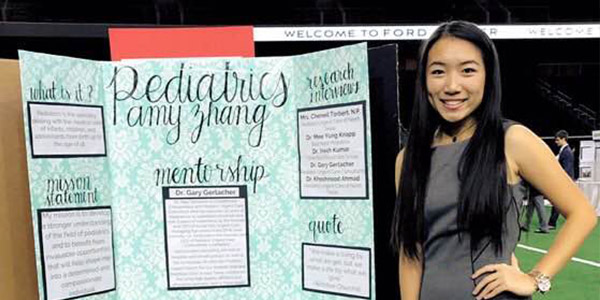 Taking place at the Ford Center at The Star for the first time, senior ISM student showcases her research on pediatrics at the ISM Research Showcase Wednesday evening. 