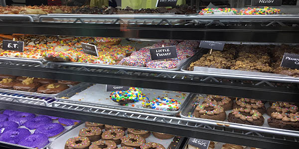 Hurts Donuts new Frisco location is attracting a lot of enthusiastic customers. 