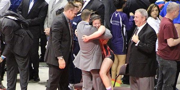 Junior Martha Moore took home a state championship on Saturday in the 119lb weight class.