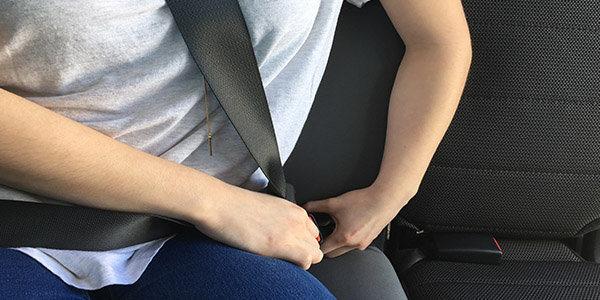 Staff reporter Hallie Winterbauer stresses the importance of buckling up when in a vehicle. 