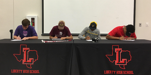 Four seniors signed to their respective colleges to play collegiate sports for the next four years.
