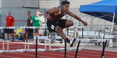 Senior Christian Palmer competes in the 300 and 400 hurdles in his fourth year on the track team. 
