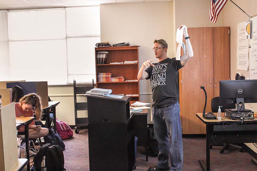 New human geography teacher and assistant soccer coach Paul Leshinski instructs his class. 