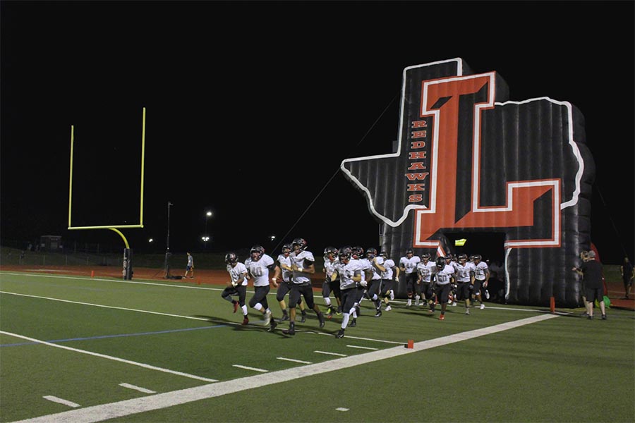 Trailing+35-3+at+the+half%2C+the+Redhawks+take+the+field+to+start+the+second+half+against+Wakeland+Friday%2C+Sept.+1+at+Memorial+Stadium.+