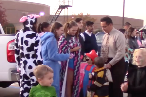 Hundreds of children and their families made their way through the band parking lot and dozens of cars filled with treats. 