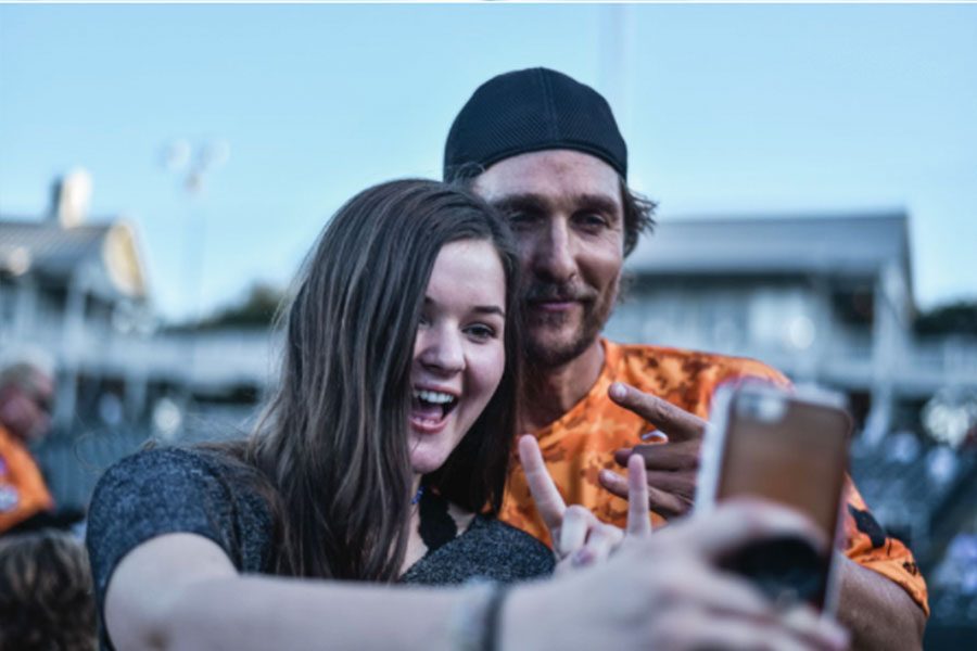 Wingspans Keegan Williams takes a selfie with McConaughey after an interview.