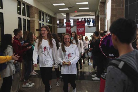 Leading the way through the halls for the girls cross country teams state send off, senior Carrie Fish is making her fourth straight trip to the state meet. 