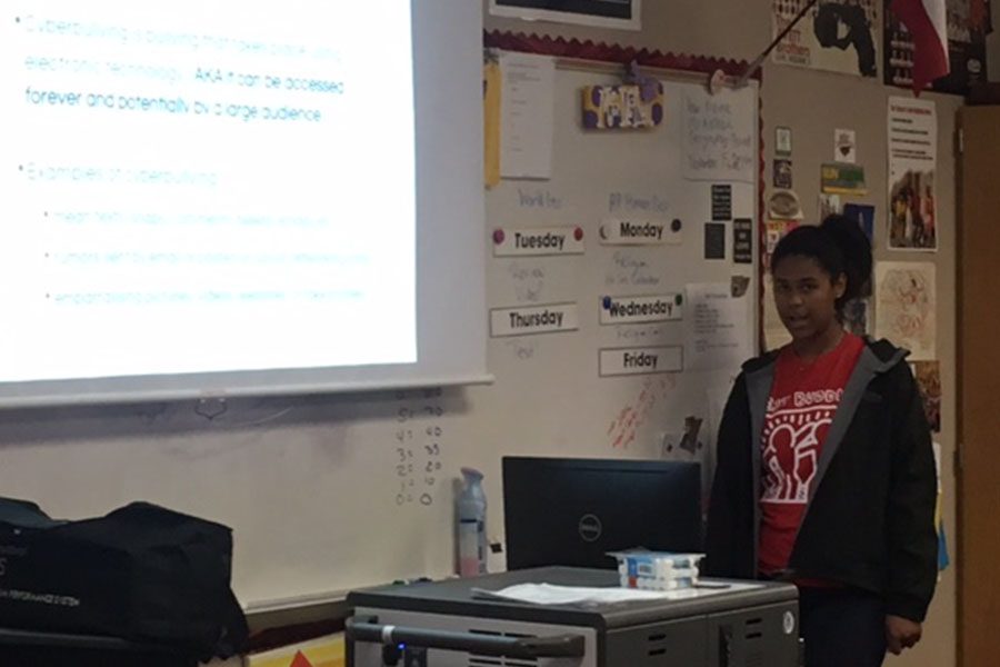 Leading a presentation on bullying on Wednesday, Nov. 15, freshman Sasha Cornelius is one of the dozens of students who have volunteered to lead Redhawk Rants this year. 