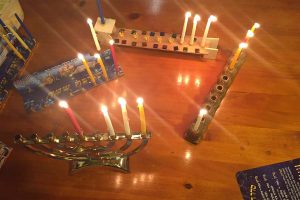 Pictured above, the menorah holds nine candles, with eight to represent the days that the Maccabees small oil 
supply burned, and one to light the others with.