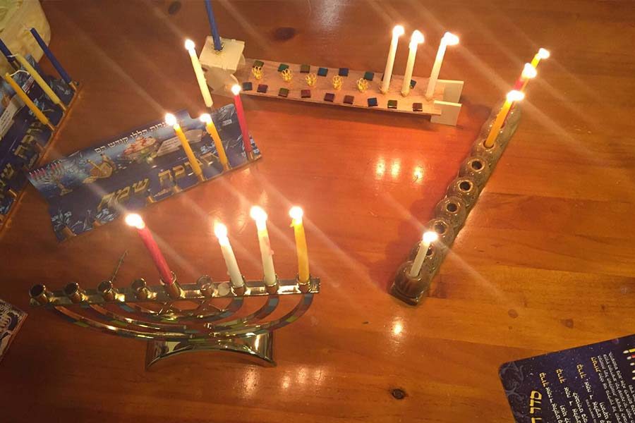 Pictured+above%2C+the+menorah+holds+nine+candles%2C+with+eight+to+represent+the+days+that+the+Maccabees+small+oil+%0Asupply+burned%2C+and+one+to+light+the+others+with.
