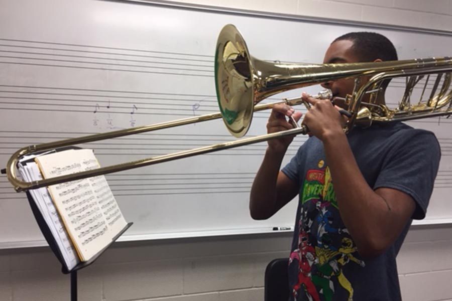Despite being in the audition process for the first time, junior Josh Lee makes efforts throughout the school day to practice.

