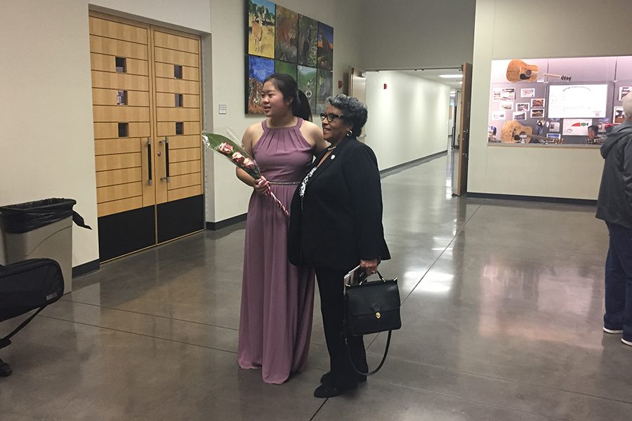Taking a picture with Vernell Gregg, the namesake of the Vernell Gregg Young Artist Competition, junior Megan Lin performed a 25 minute solo with the Lewisville Lake Symphony on Friday night. In addition to performing her solo, Lin also received the $1,000 Bill and Grace Lawrence Scholarship. 