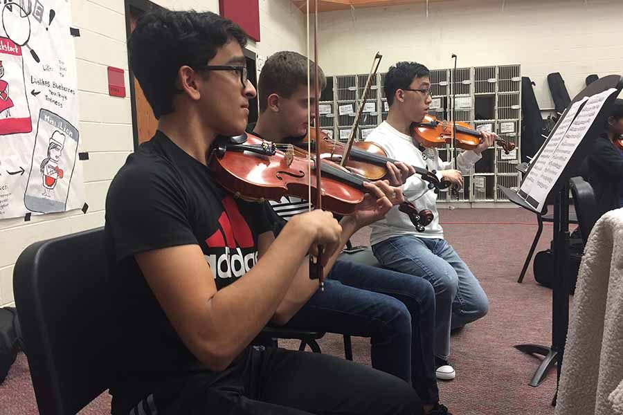 Playing violin for six years, junior Sayyant Rath decided to try the instrument after his mom steered him away from a brass instrument because they were too loud.