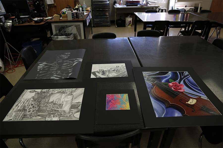 Working on art throughout the year, at least nine Redhawks received the highest score of four from judges in the VASE competition Saturday at Memorial High School. 
