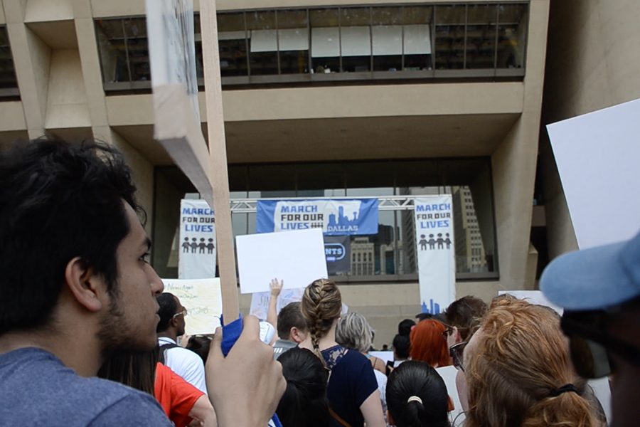 Protesters gather in front of Dallas City Hall for the March For Our Lives rally.