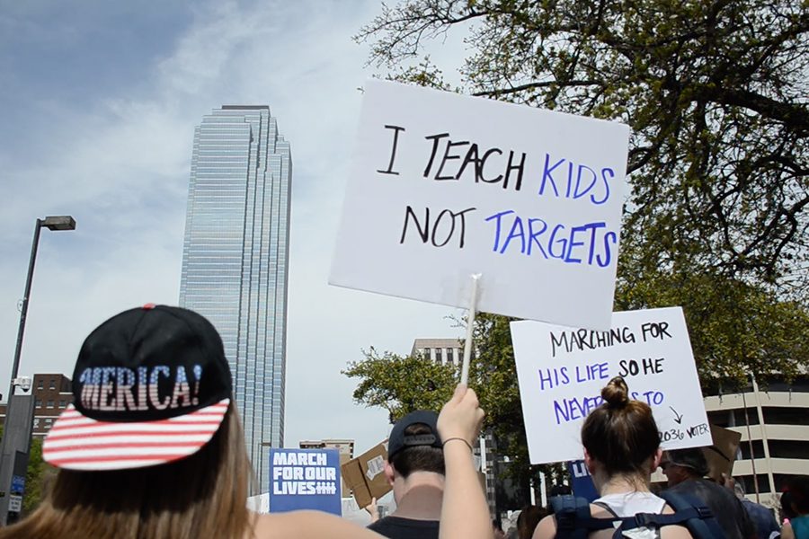A variety of signs were on display at Saturdays March for Our Lives rally including this one from a teacher.