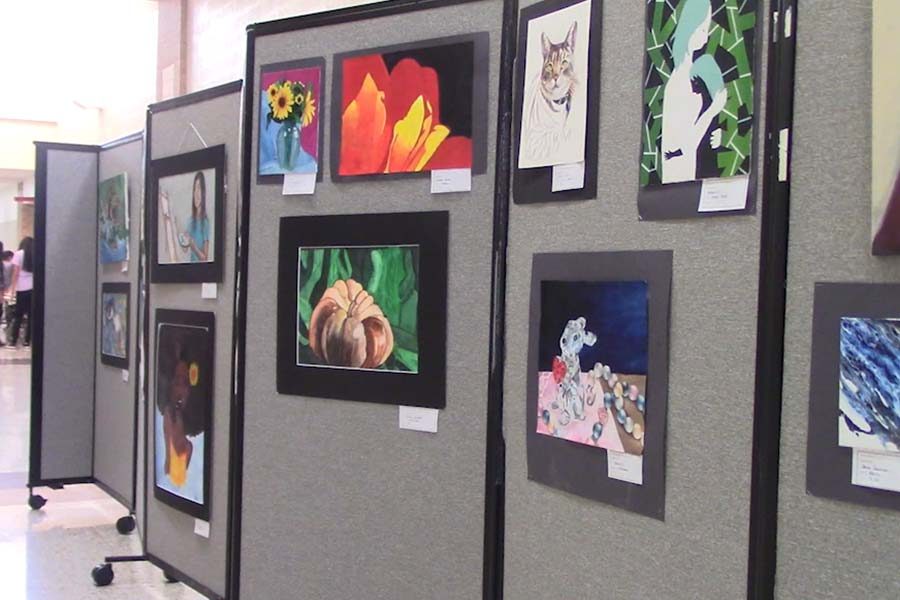 Student artwork lined the hallways Friday night for the National Art Honors Society Art Gallery Show with students not only having the chance to display their art, but topotentially sell it as well. 