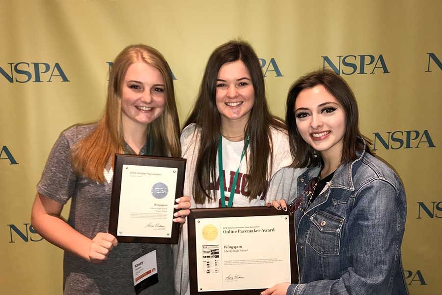 Editors Kasey Harvey, Keegan Williams, and Brooke Colombo hold up what is often referred to as the pulitzer prize of journalism, the Online Pacemaker.