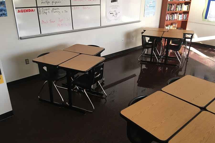 AP Lang teacher Chad Doty found his classroom flooded this morning, and was soon relocated to C140