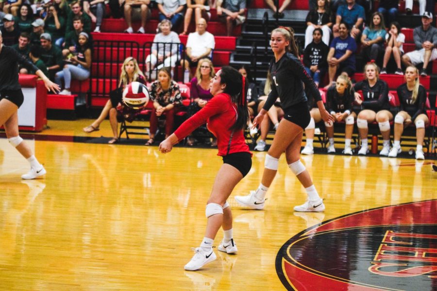 In position to set the ball, senior Izzi Rodriguez and the rest of the Redhawks look to continue their winning streak Friday night at Lone Star.  The Redhawks have won three straight games and enter the game in a five-way tie for first place in District 9-5A.