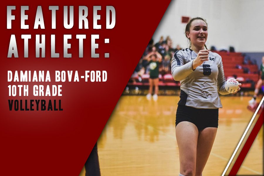 Preparing+to+give+a+fist+bump+to+the+referees+before+the+start+of+the+game%2C+Damiana+Bova-Ford+takes+a+spot+on+varsity+in+her+sophomore+year.